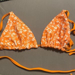 Orange and white floral bikini top